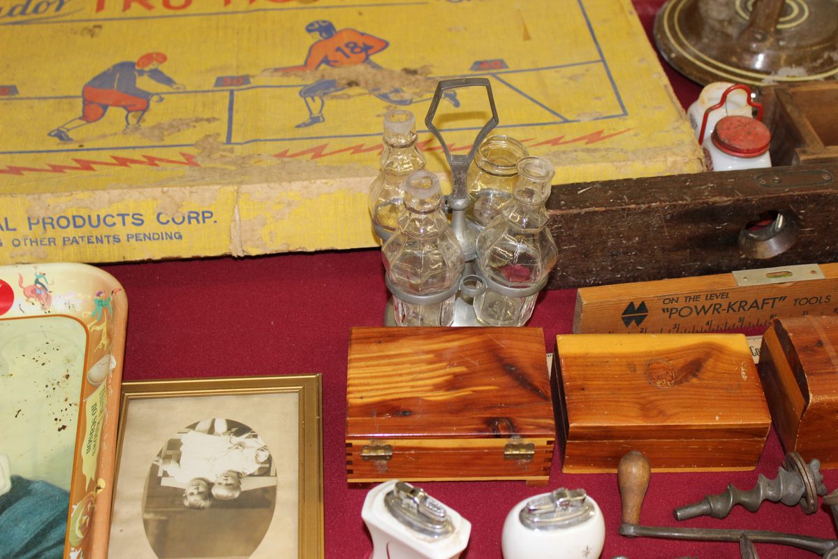 Table of antique items at McCoy estate auction Franklin County PA