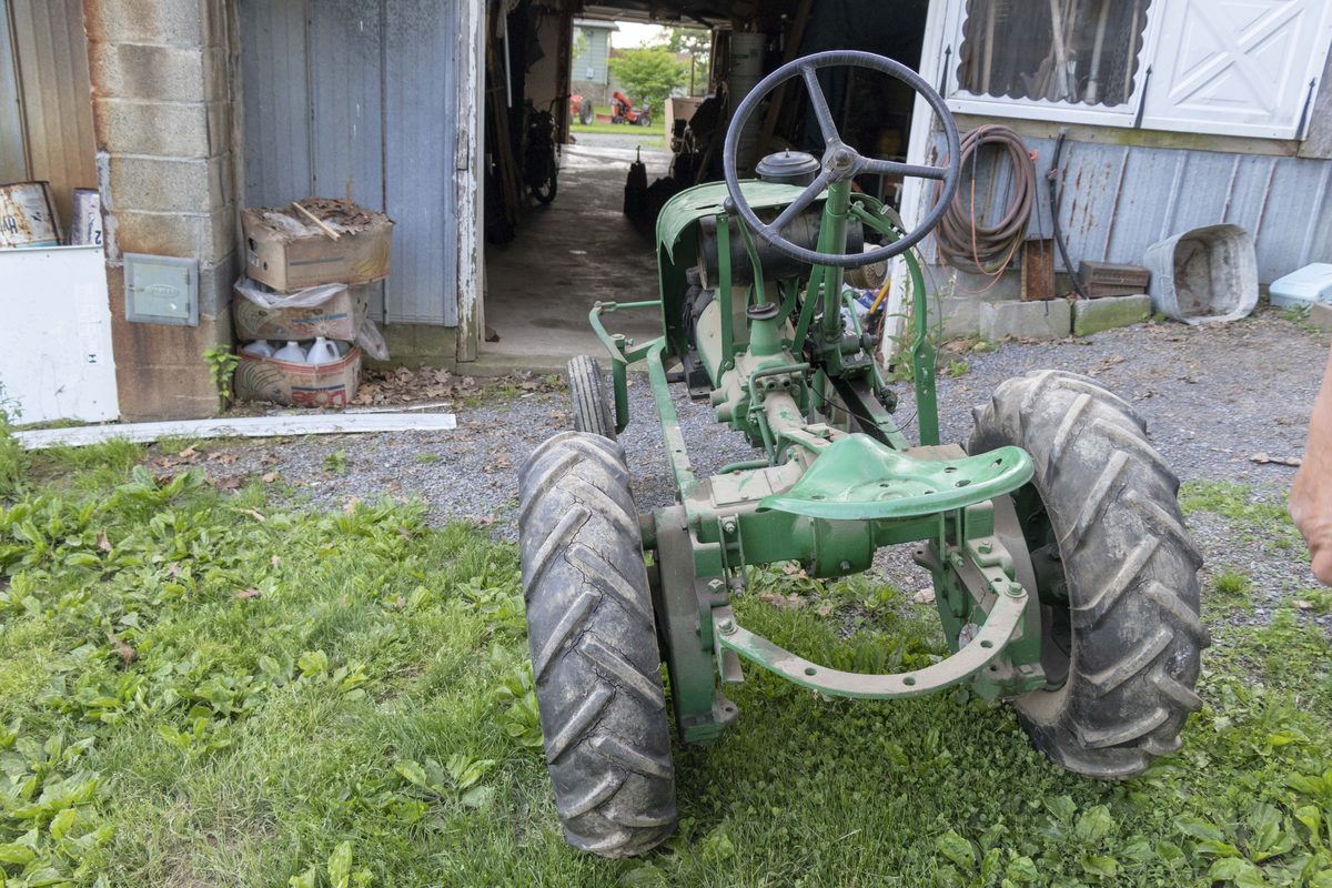 Antique green tractor at Franklin County farm estate auction
